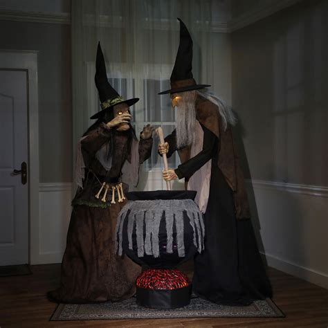 Animatronic figure of a witch sitting